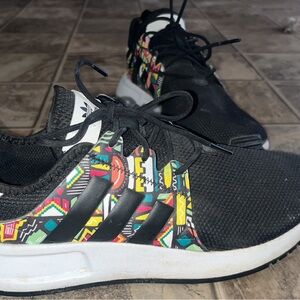 Adidas Black Athletic Shoes with Unique Lacing System